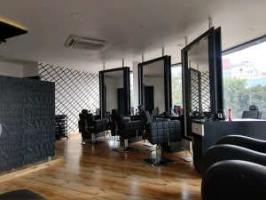 Dharmpal Hair Saloon logo